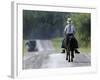 With a Buggy Approaching in the Distance, an Amish Boy Heads Down a Country Road on His Pony-Amy Sancetta-Framed Photographic Print