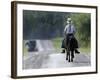 With a Buggy Approaching in the Distance, an Amish Boy Heads Down a Country Road on His Pony-Amy Sancetta-Framed Photographic Print