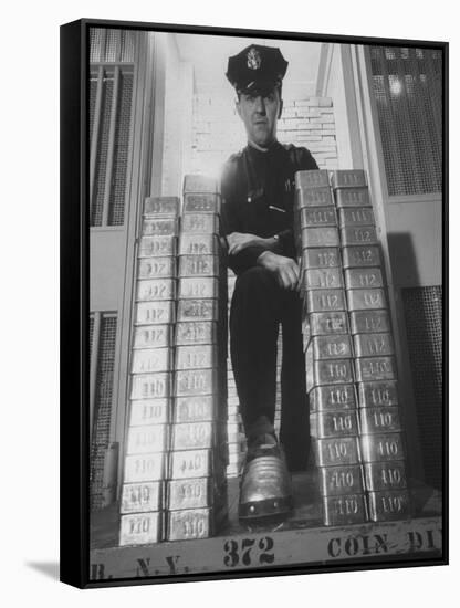 With Gold Bars in Federal Reserve Bank, Guard Wearing Protective Aluminum Overshoes-Walter Sanders-Framed Stretched Canvas
