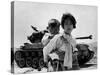 With Her Brother on Her Back, a War Weary Korean Girl Tiredly Trudges by a Stalled M-26 Tank-null-Stretched Canvas