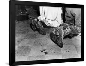 With Soiled Army Boots, a Chaplain and Soldier Kneel at Catholic Mass Is Held for Two Dead Soldiers-null-Framed Photo