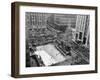 With the Famed Rockefeller Center Christmas Tree Rising Above Them, Skaters Glide on the Ice-null-Framed Photographic Print