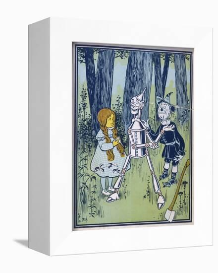 Wizard of Oz: Dorothy Oils the Tin Woodman's Joints-W.w. Denslow-Framed Photographic Print