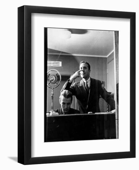 Wolfe, NBC Radio Director, Makes Timing Gestures Through the Glass Window of the Control Room-Alfred Eisenstaedt-Framed Photographic Print