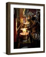 Woman Adding the Melting Yak Butter from Her Lamp to Those of the Temple, Bharkor, Tibet-Don Smith-Framed Photographic Print