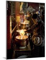 Woman Adding the Melting Yak Butter from Her Lamp to Those of the Temple, Bharkor, Tibet-Don Smith-Mounted Photographic Print