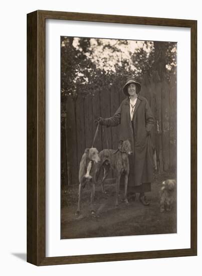 Woman and Dogs in Garden-null-Framed Photographic Print