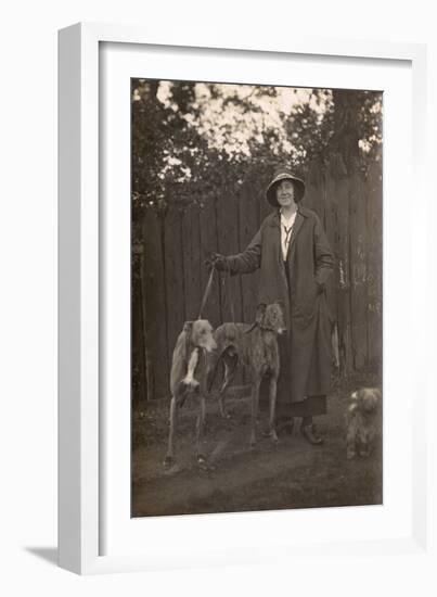 Woman and Dogs in Garden-null-Framed Photographic Print