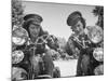 Woman and Her Daughter Sharing Interest in Motorcycle Racing-Sam Shere-Mounted Photographic Print