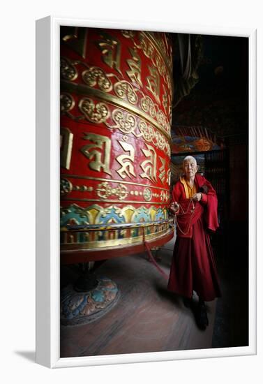 Woman and prayer wheel, Bodhnath Stupa, Kathmandu, Nepal-Godong-Framed Photographic Print