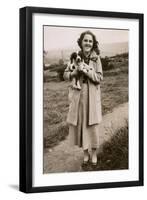 Woman and Puppy on a Hillside-null-Framed Photographic Print