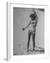 Woman Applying Suntan Lotion at the Beach-Peter Stackpole-Framed Premium Photographic Print