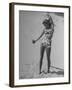 Woman Applying Suntan Lotion at the Beach-Peter Stackpole-Framed Premium Photographic Print