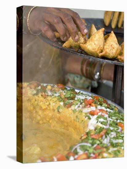 Woman Arranging Freshly Cooked Samosas, Market, Darjeeling, West Bengal, India-Jane Sweeney-Stretched Canvas