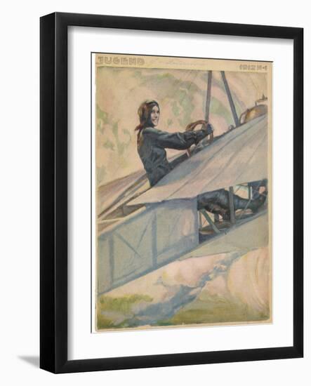 Woman at the Controls of an Early Aeroplane-null-Framed Art Print