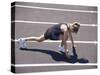 Woman at the Starting Pose on a Running Track-null-Stretched Canvas