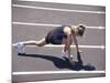 Woman at the Starting Pose on a Running Track-null-Mounted Photographic Print