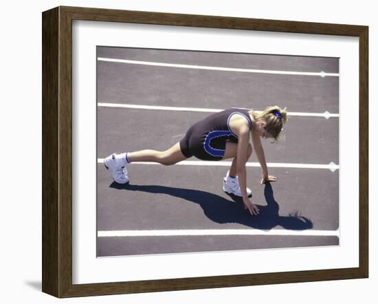 Woman at the Starting Pose on a Running Track-null-Framed Photographic Print