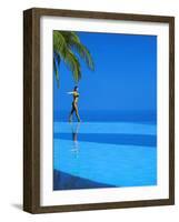 Woman Balancing on Edge of Infinity Pool, Maldives, Indian Ocean-Papadopoulos Sakis-Framed Photographic Print