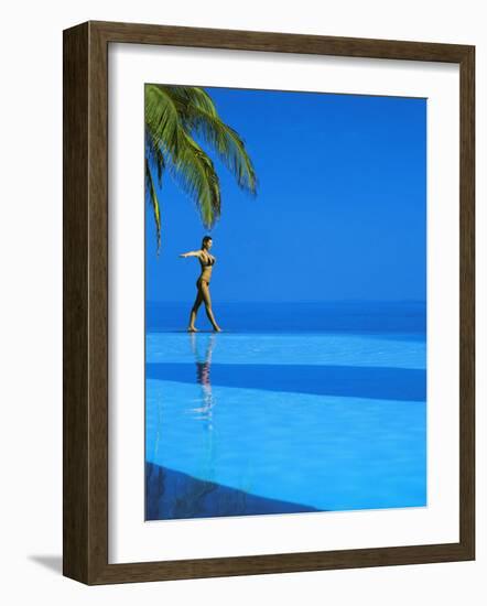 Woman Balancing on Edge of Infinity Pool, Maldives, Indian Ocean-Papadopoulos Sakis-Framed Photographic Print