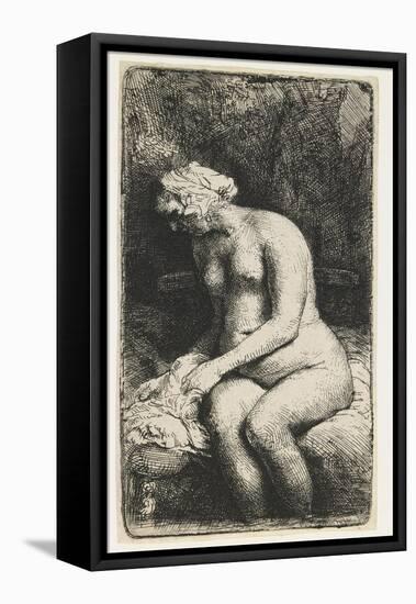 Woman Bathing Her Feet at a Brook, 1658-Rembrandt van Rijn-Framed Stretched Canvas