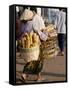 Woman Carrying Baskets of French Bread, Talaat Sao Market in Vientiane, Laos, Southeast Asia-Alain Evrard-Framed Stretched Canvas