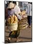 Woman Carrying Baskets of French Bread, Talaat Sao Market in Vientiane, Laos, Southeast Asia-Alain Evrard-Mounted Premium Photographic Print