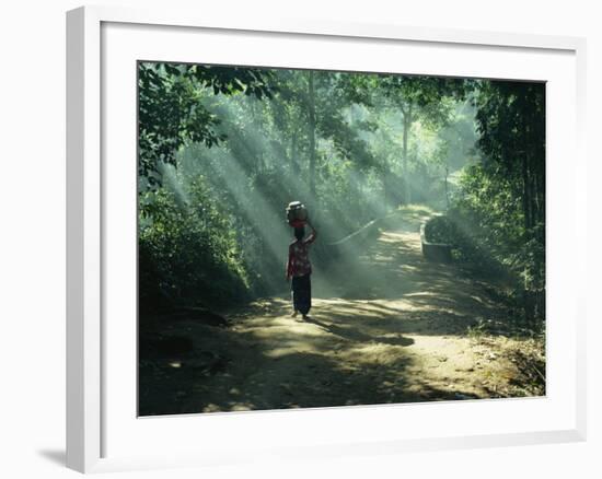 Woman Carrying Coconuts to Market, Peliatan, Bali, Indonesia, Southeast Asia-James Green-Framed Photographic Print