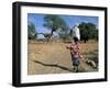 Woman Carrying Sack on Her Head, Ogol Village, Sangha, Dogon Area, Mali, Africa-Bruno Morandi-Framed Photographic Print