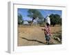 Woman Carrying Sack on Her Head, Ogol Village, Sangha, Dogon Area, Mali, Africa-Bruno Morandi-Framed Photographic Print