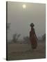 Woman Carrying Water Jar in Sand Storm, Thar Desert, Rajasthan, India-Keren Su-Stretched Canvas
