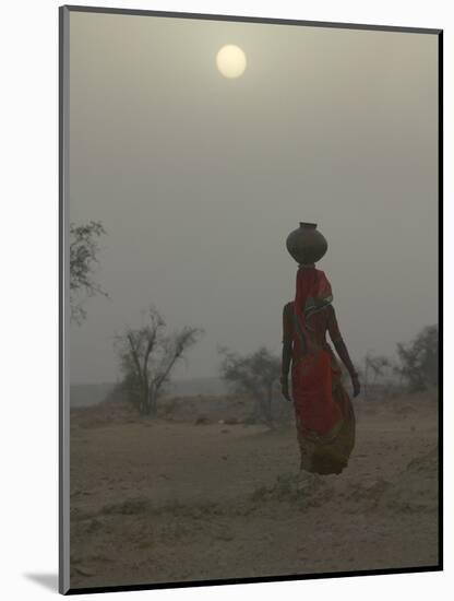 Woman Carrying Water Jar in Sand Storm, Thar Desert, Rajasthan, India-Keren Su-Mounted Photographic Print