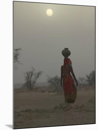 Woman Carrying Water Jar in Sand Storm, Thar Desert, Rajasthan, India-Keren Su-Mounted Photographic Print