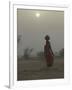 Woman Carrying Water Jar in Sand Storm, Thar Desert, Rajasthan, India-Keren Su-Framed Photographic Print