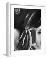 Woman Cautiously Placing a Contact Lens in Her Eye-Al Fenn-Framed Photographic Print