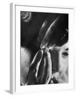 Woman Cautiously Placing a Contact Lens in Her Eye-Al Fenn-Framed Photographic Print