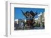 Woman Cleaning a Giant Bird Statue-Michael Runkel-Framed Photographic Print