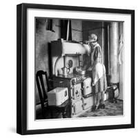 Woman Cooking on Old Fashioned Stove-Walter Sanders-Framed Photographic Print