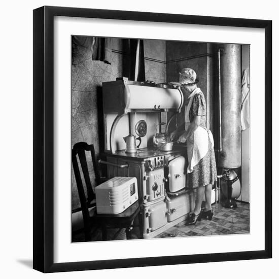 Woman Cooking on Old Fashioned Stove-Walter Sanders-Framed Photographic Print
