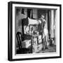 Woman Cooking on Old Fashioned Stove-Walter Sanders-Framed Photographic Print