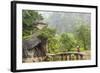 Woman Crossing Bridge with Bicycle to Temple, Tam Coc Nr Ninh Binh, Nr Hanoi, Vietnam-Peter Adams-Framed Photographic Print