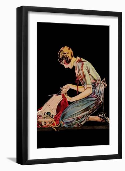 Woman Cuts a Dress Patter with Her Scissors-null-Framed Art Print