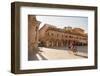 Woman Cycling Through Piazza Del Popolo, Ascoli Piceno, Le Marche, Italy-Ian Trower-Framed Photographic Print