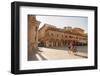 Woman Cycling Through Piazza Del Popolo, Ascoli Piceno, Le Marche, Italy-Ian Trower-Framed Photographic Print
