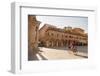 Woman Cycling Through Piazza Del Popolo, Ascoli Piceno, Le Marche, Italy-Ian Trower-Framed Photographic Print