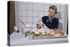 Woman Decorating Cup Cakes-William P. Gottlieb-Stretched Canvas