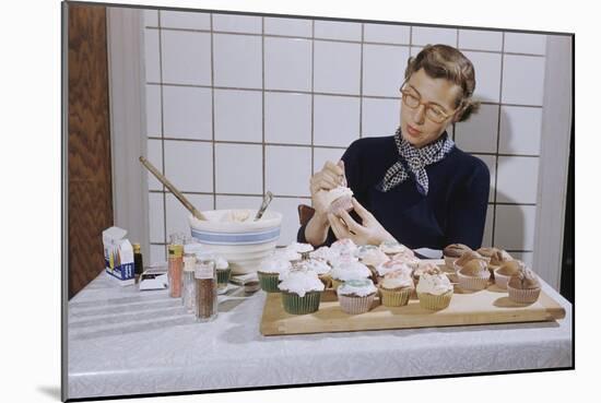 Woman Decorating Cup Cakes-William P. Gottlieb-Mounted Photographic Print