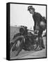 Woman Dispatch Rider Standing Beside Her Motorcycle-Hans Wild-Framed Stretched Canvas