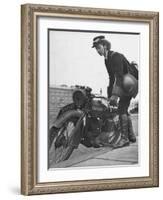 Woman Dispatch Rider Standing Beside Her Motorcycle-Hans Wild-Framed Photographic Print