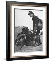 Woman Dispatch Rider Standing Beside Her Motorcycle-Hans Wild-Framed Photographic Print